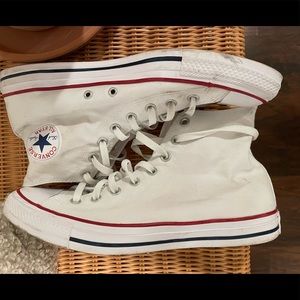 All white converse, high tops.